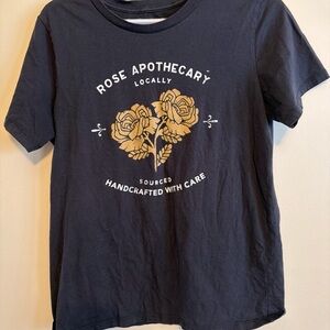 Black Graphic T-Shirt with Gold Floral Design